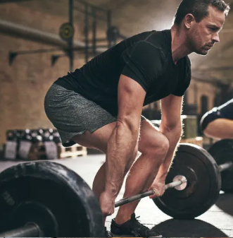 A man in his 40s deadlifting